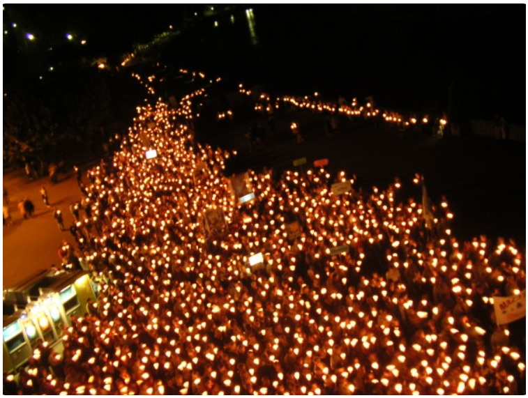 Nightly in Lourdes, thousands of Catholic pilgrims take part in a torchlight procession.